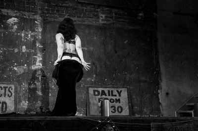 Rear view of female burlesque performer 