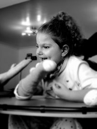 Close-up of boy playing with ball