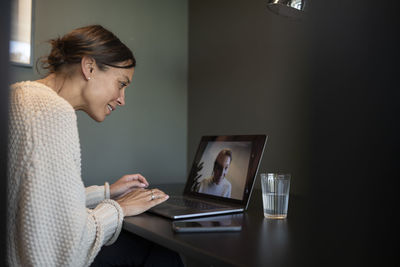 Woman attending videoconference