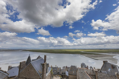 Panoramic view of houses against sky