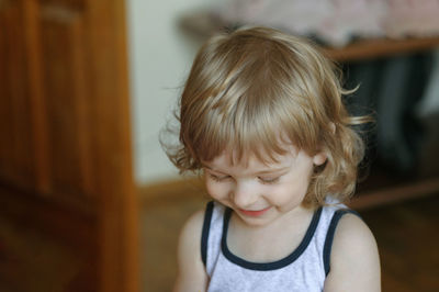 Portrait of cute girl at home