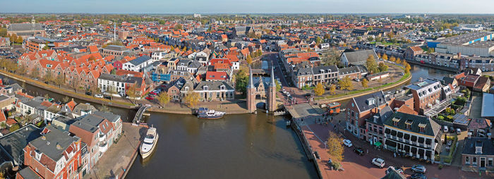 Aerial panorama from the historical city sneek with the watergate in friesland the netherlands