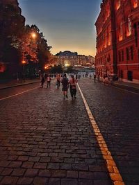 People walking on street in city