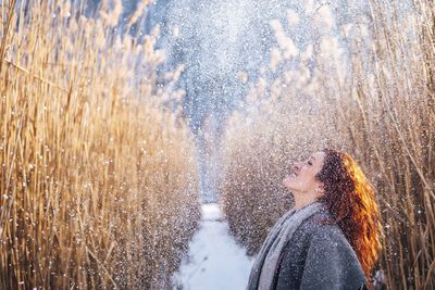 Young woman enjoing the snow