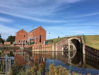 View of canal along buildings