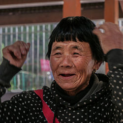 Portrait of woman looking at camera