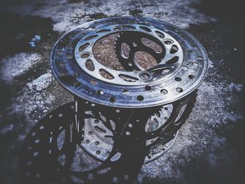 High angle view of rusty wheel