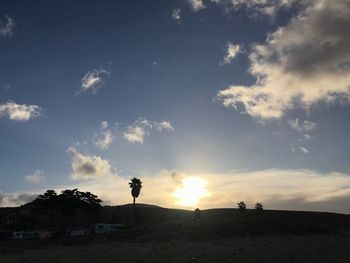 Silhouette of trees against sky during sunset