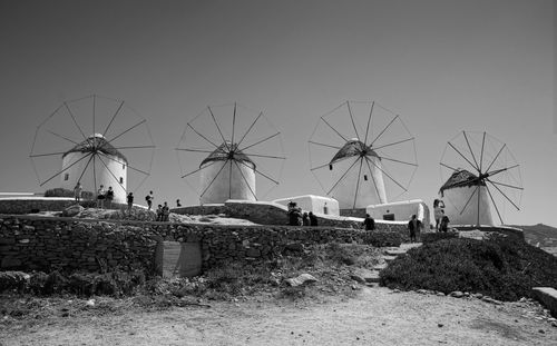 Traditional windmills against clear sky