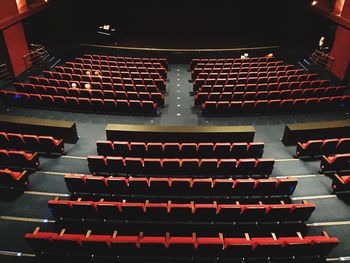 High angle view of empty chairs in stadium