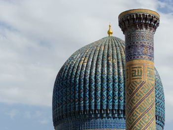 Low angle view of sculpture against sky