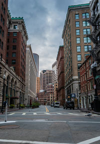 Buildings in city against sky