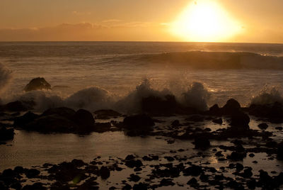 Scenic view of sea at sunset