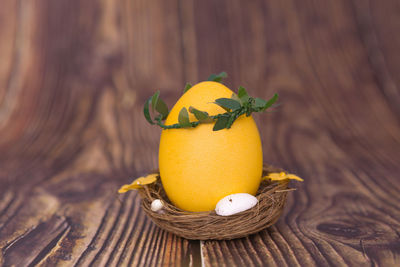 Close-up of yellow fruit on table