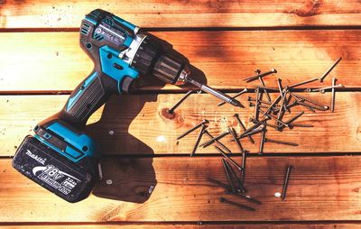 High angle view of drill machine on table