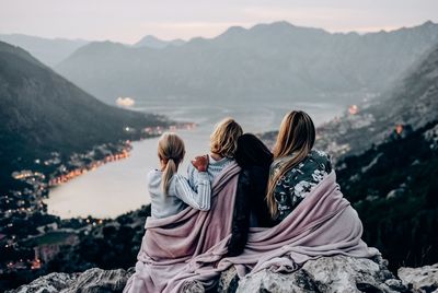 Rear view of woman looking at mountains