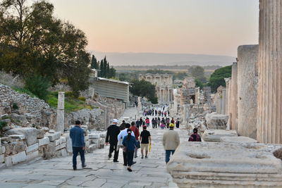 Group of people in front of historical building