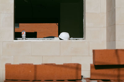 Man in front of built structure