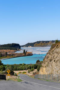 Scenic view of sea against clear blue sky