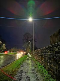 Illuminated street lights at night
