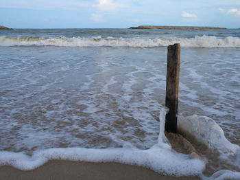 Scenic view of beach against sky