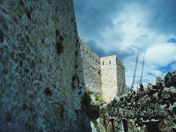 Low angle view of fort against sky