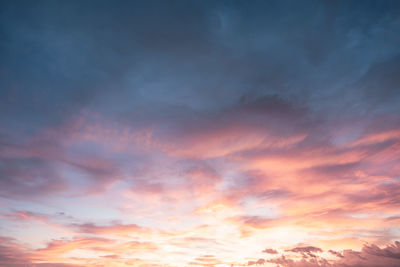 Low angle view of dramatic sky during sunset