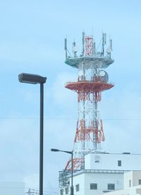 Low angle view of communications tower against clear sky