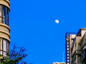 Low angle view of building against blue sky