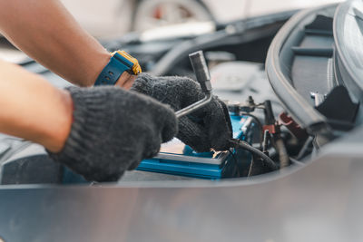 Low section of man driving car