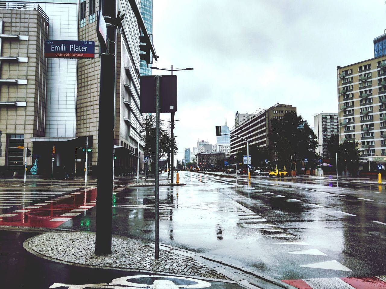 VIEW OF CITY STREET AND BUILDINGS