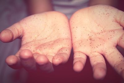 Close-up of person hand holding water