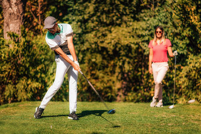 Driver golf swing from the tee box