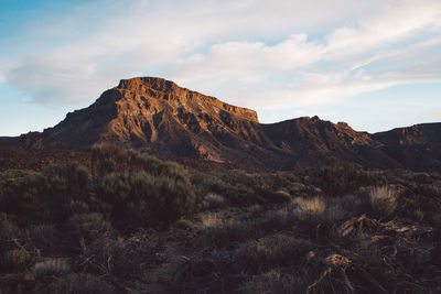 Scenic view of rocky mountains against sky