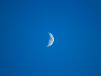 Low angle view of moon in sky