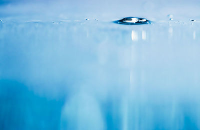 Close-up of water splashing in swimming pool