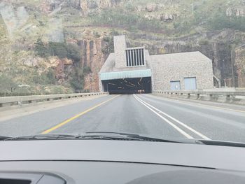 Road seen through car windshield