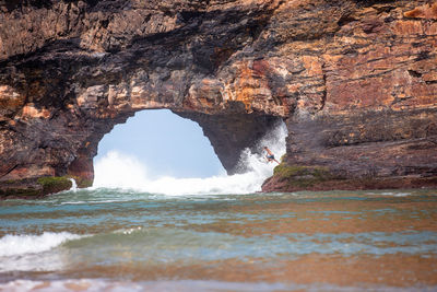 Scenic view of rock formation in sea