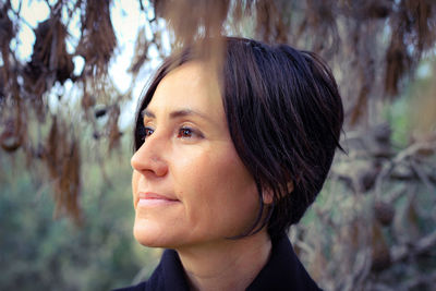 Close-up of mature woman looking away