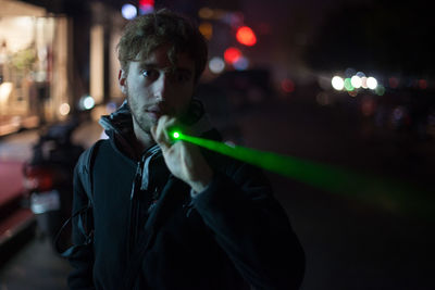 Full length of woman standing at night