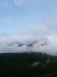 View of landscape against cloudy sky