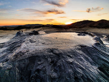 Scenic view of mountains against sky during sunset