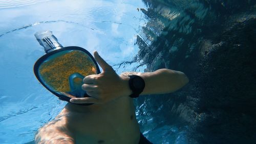 Man swimming in sea