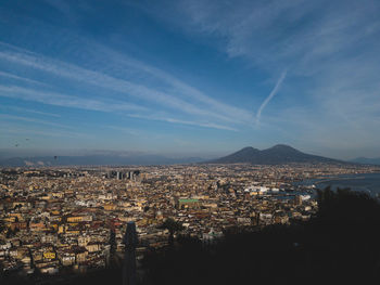 Aerial view of townscape against sky