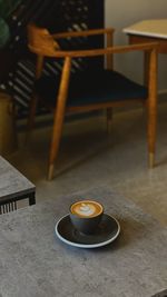 High angle view of coffee cup on table