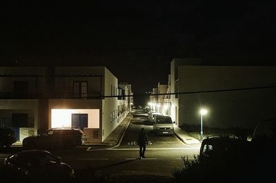 Illuminated street light at night