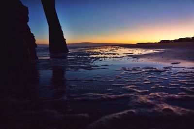 Scenic view of sea against sky at sunset