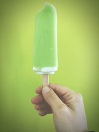 Close-up of ice cream cone against white background