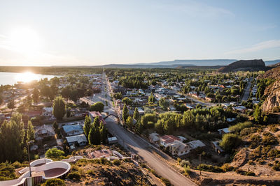 High angle view of buildings in city against sky