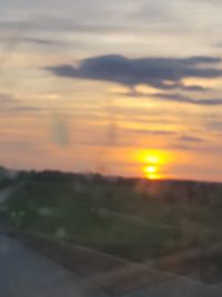 Scenic view of dramatic sky during sunset